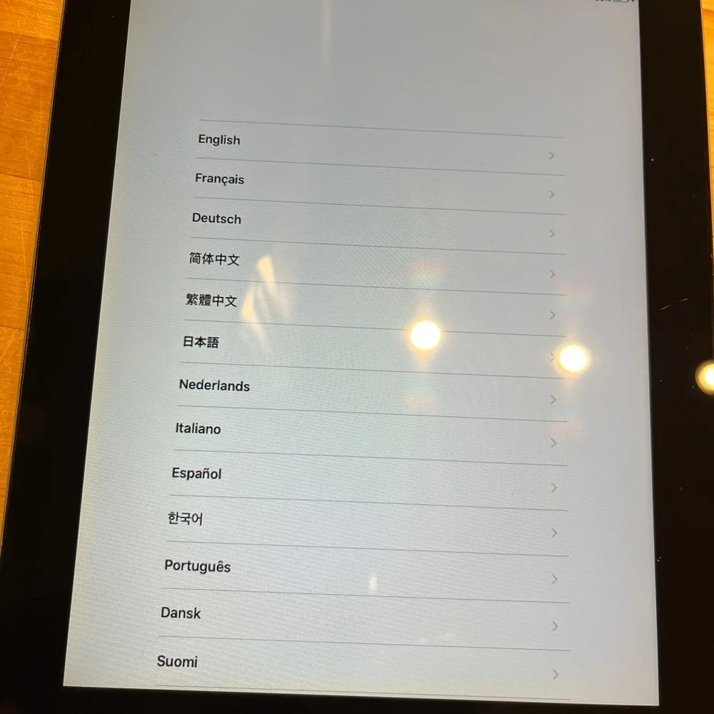 iPad 2 w/headphones & cable